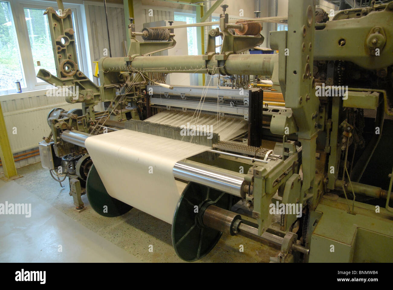 Historic weaving machine (still in use), Klässbols Linneväveri, Värmland, Sweden Stock Photo