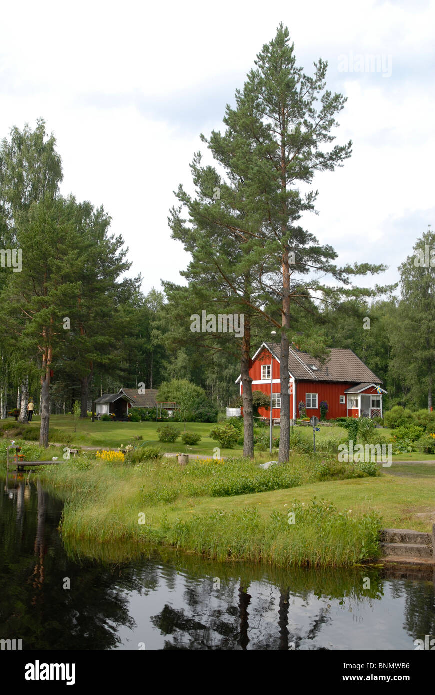 House at a lake, Lenungshammar, Glaskogen, Värmland, Sweden Stock Photo
