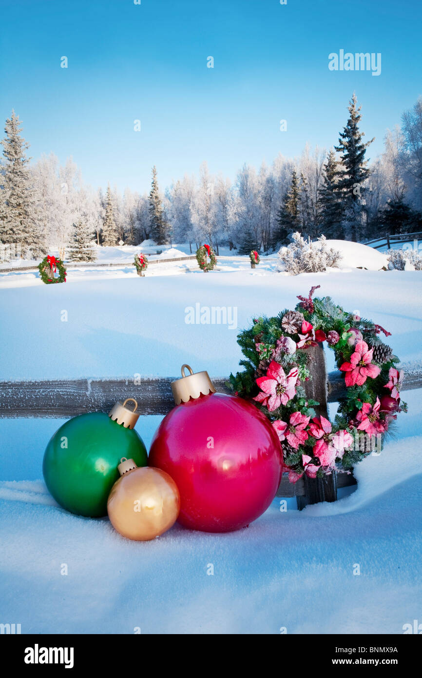 Split Rail Fence Decorated With Christmas Wreaths And Decorations