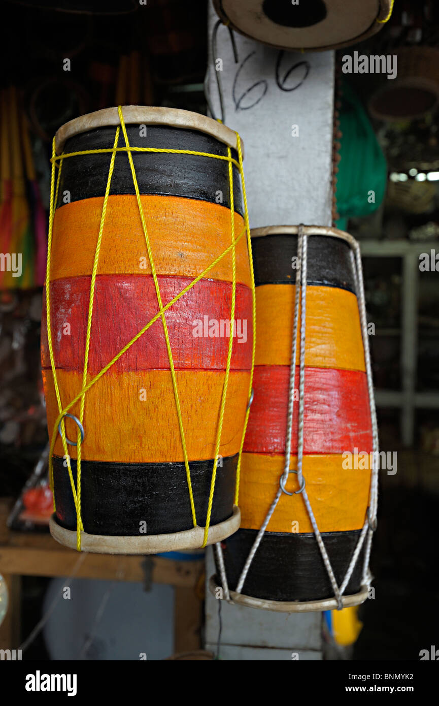 Drums for sale in a street market in Kandy, Sri Lanka during a budh purnima festival. Stock Photo