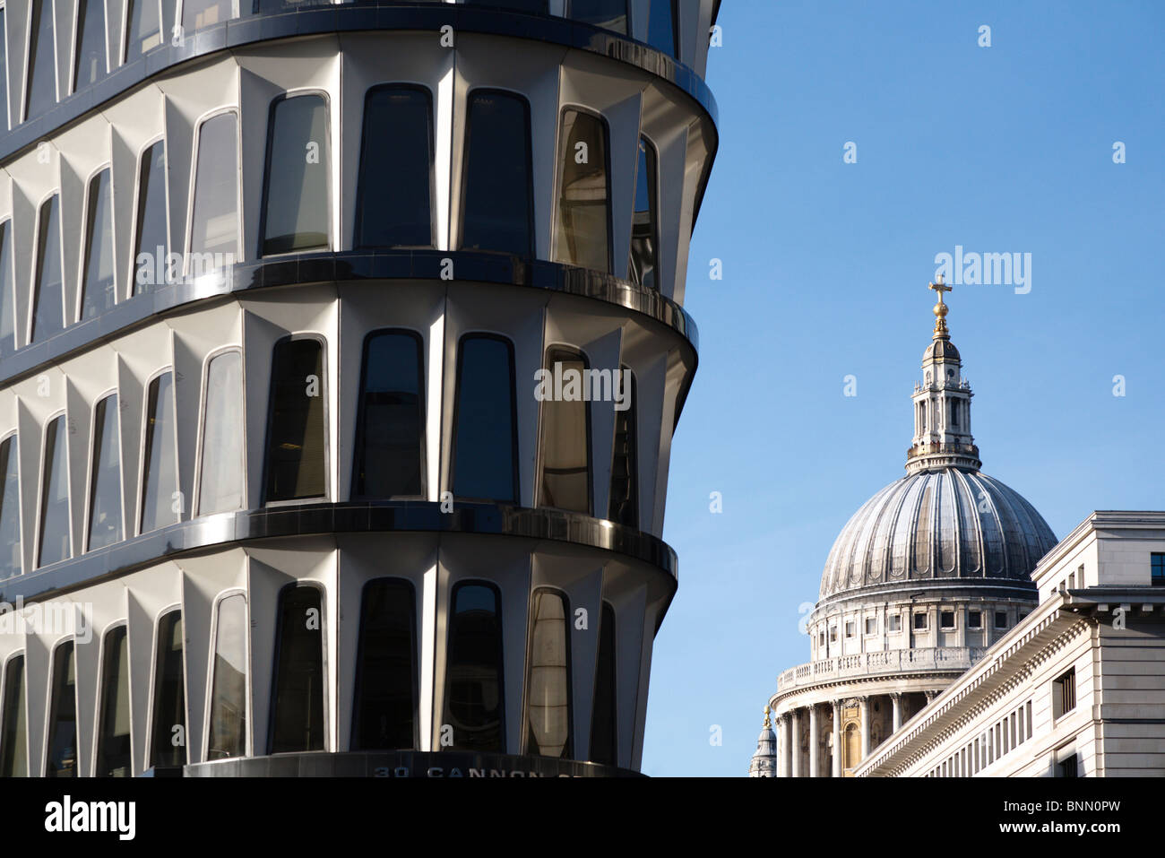 The Corner of 30 Cannon Street with the dome of St.Paul's Cathedral in the background Stock Photo