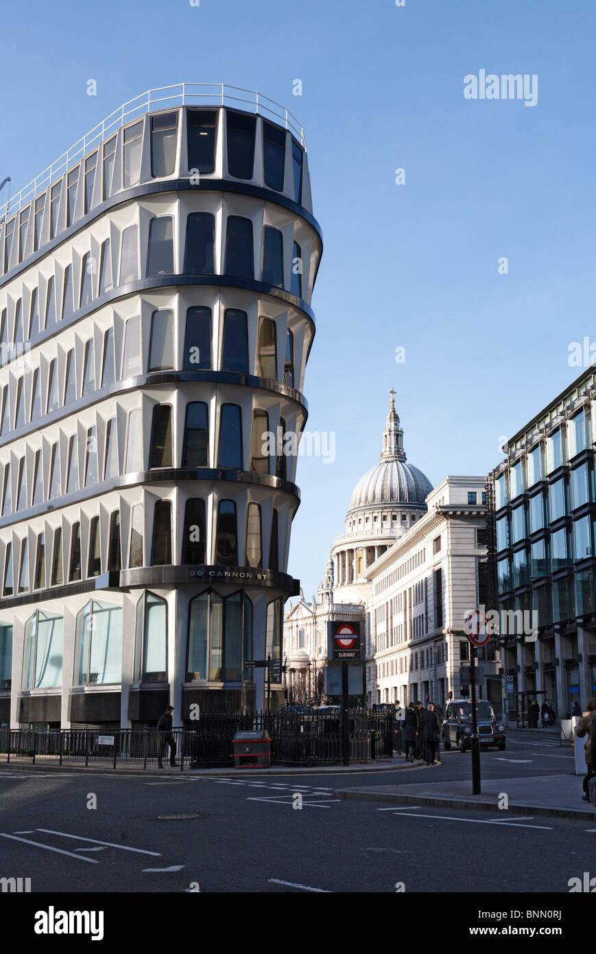 The corner of 30 Cannon Street with the dome of St.Paul's Cathedral in the background Stock Photo