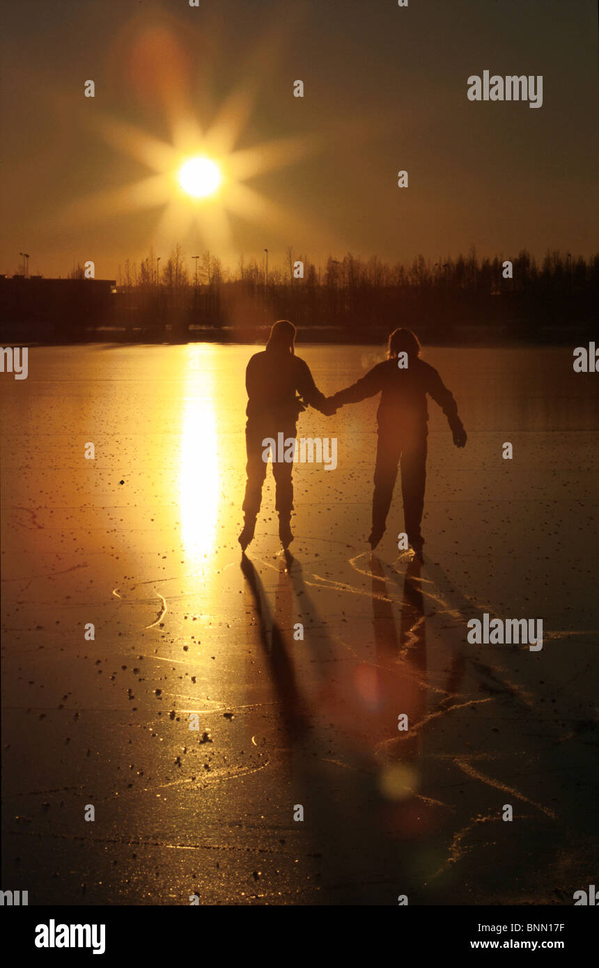 Couple Ice Skating Lake Hood Anchorage Southcentral AK winter scenic Stock Photo Alamy