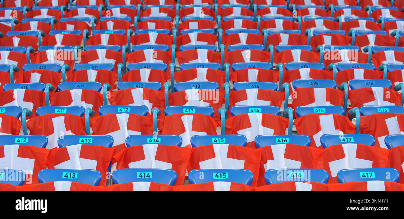 Stadium football soccer to seat empires seats seating chairs flags flags banners red sport Switzerland Basel Saint Jakob Stock Photo