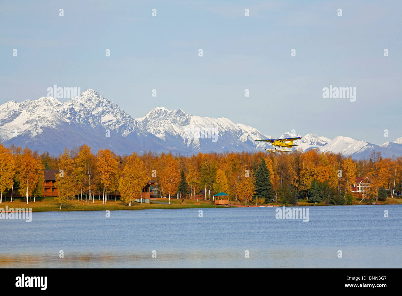 Float plane taking off from Lake Lucille in Wasilla, SC, Alaska Stock Photo