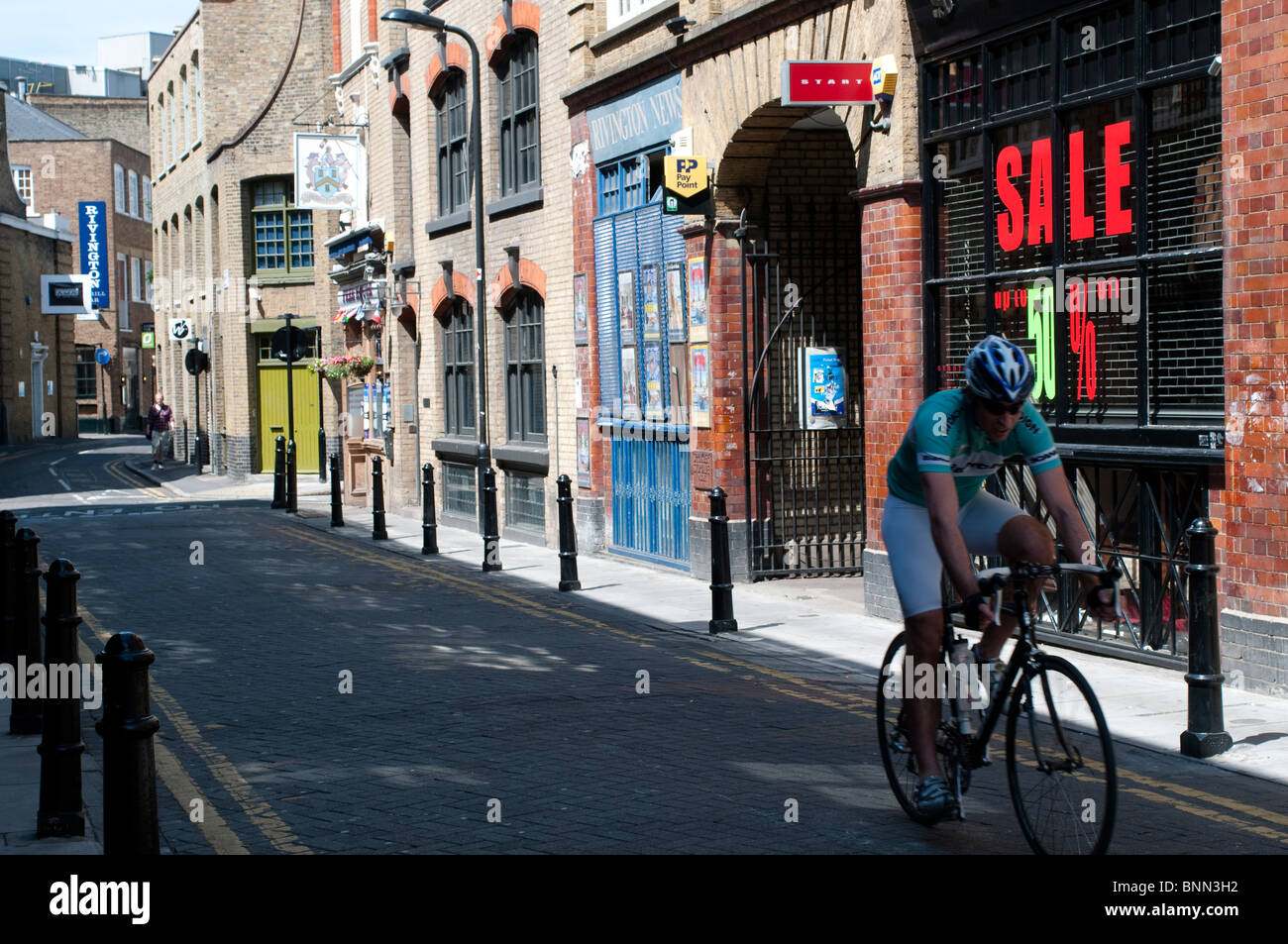 Cyclist, Rivington Street, London, EC2, UK Stock Photo