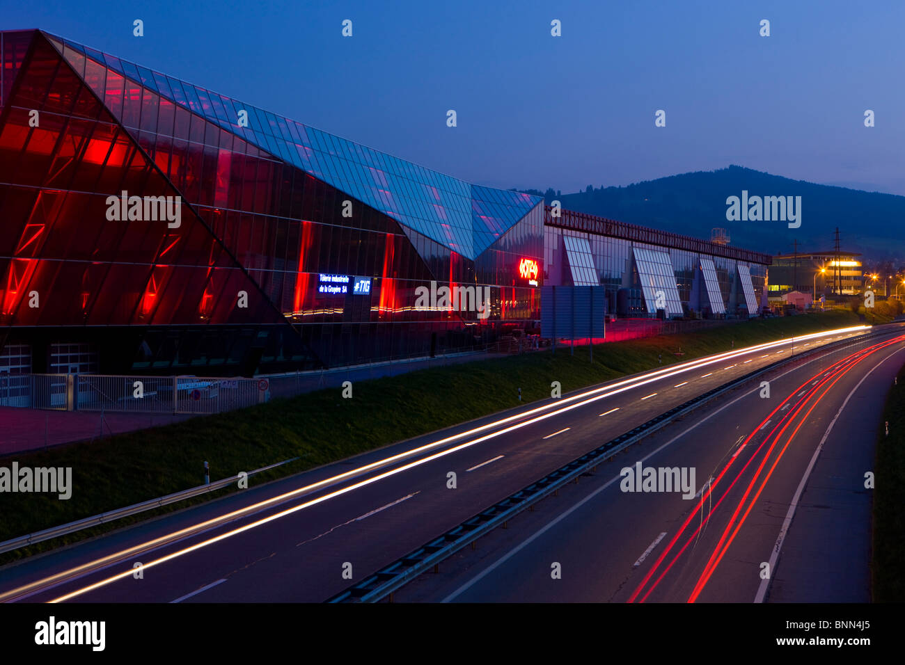 Bull Switzerland canton Freiburg dusk twilight house home factory glass ...