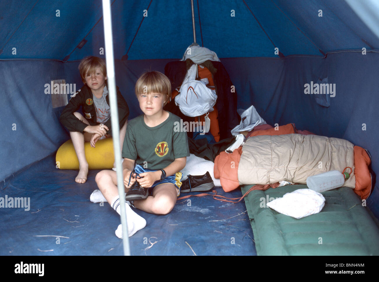 children in a tent at summer camp Stock Photo