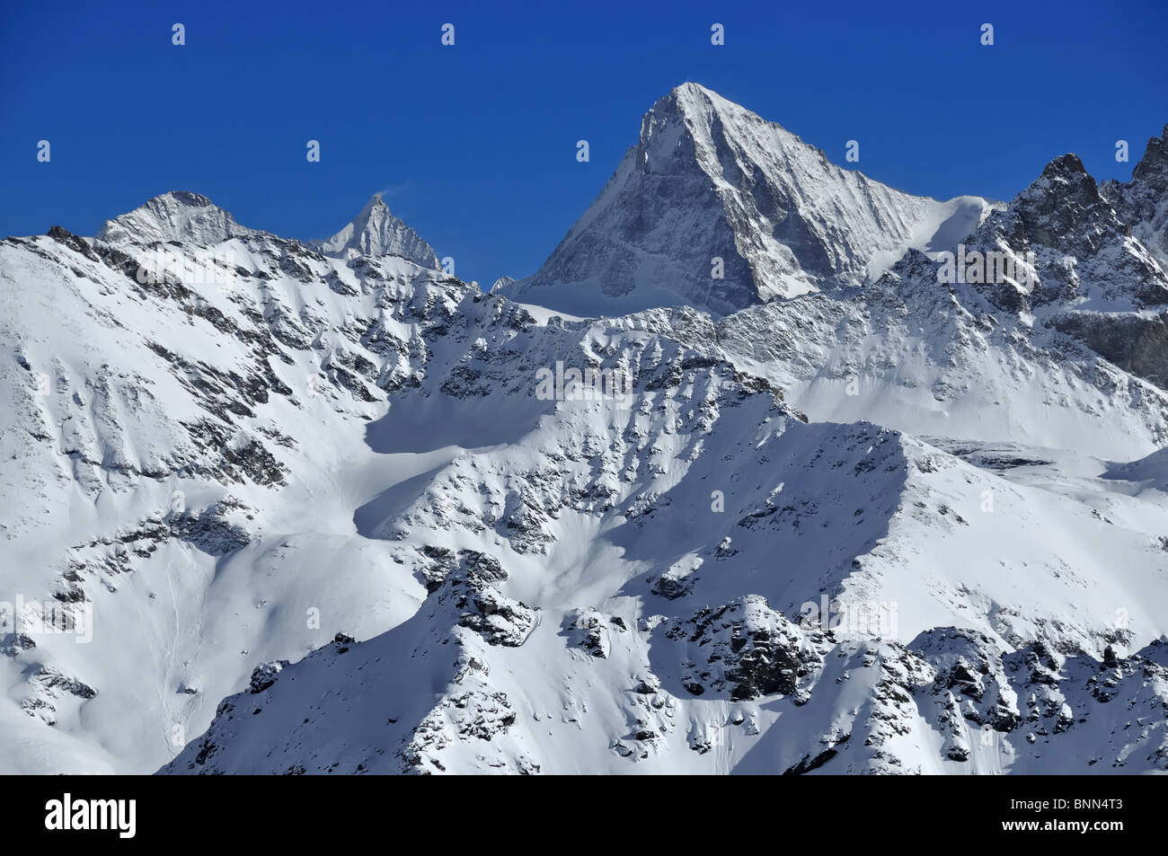 vertical steep switzerland swiss snow ridge Zermatt summit west face ...