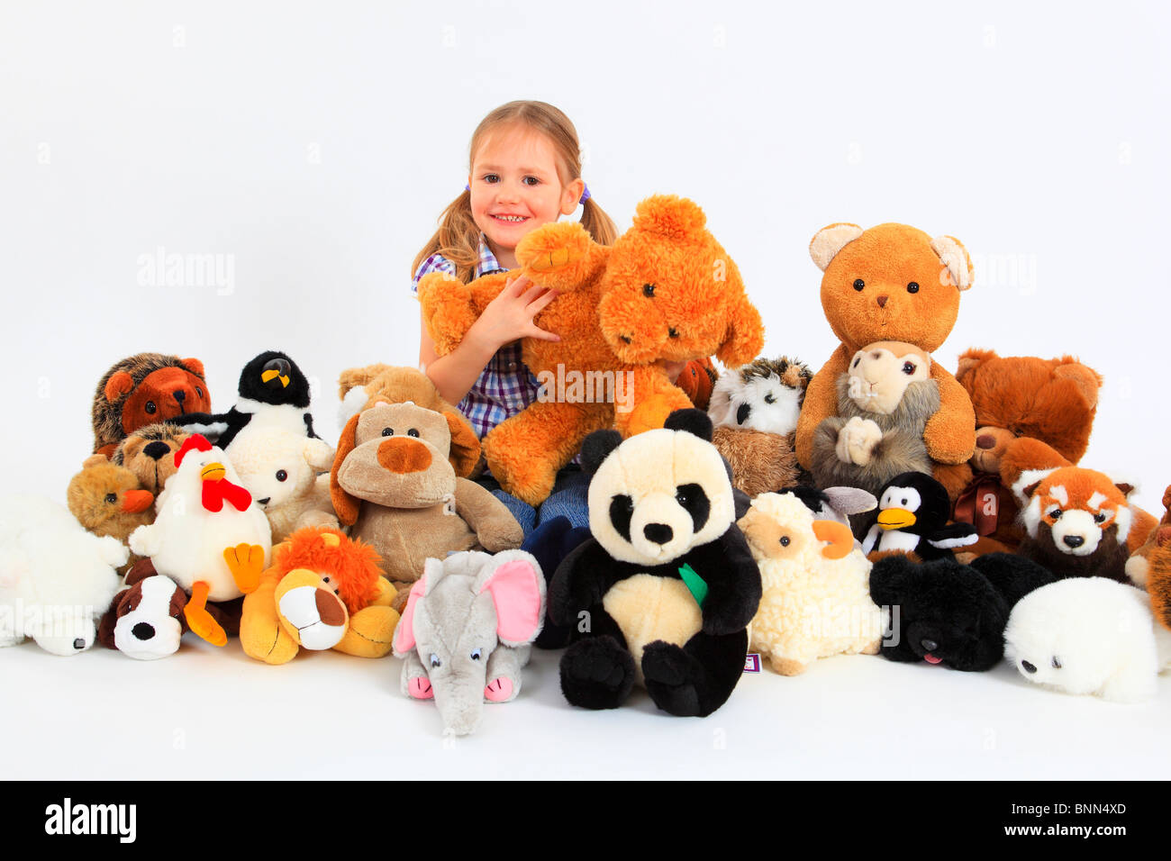 3 3 years 3-year-old blouse bear squirrel elephant donkey owl family joy luck happiness group background dog hedgehog Jeans Stock Photo