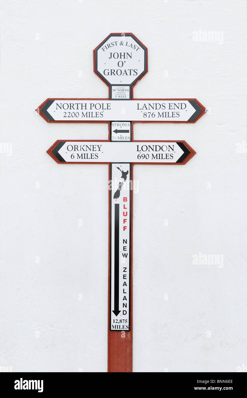 Sign showing distance from John O'Groats in Scotland to the North Pole, Lands End, London and New Zealand. Stock Photo