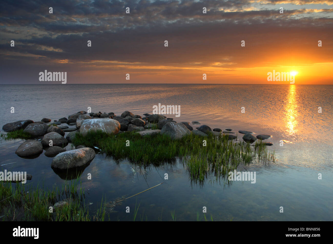 Sunset at Baltic coast Stock Photo - Alamy