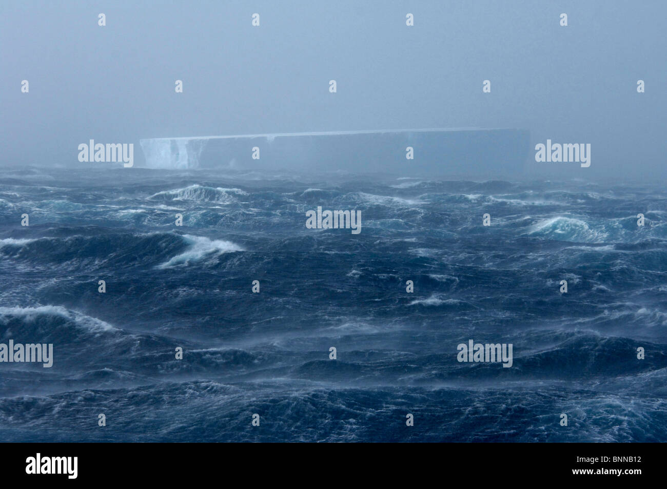 Antarctic Antarctica hurricane storm waves foam iceberg Stock Photo