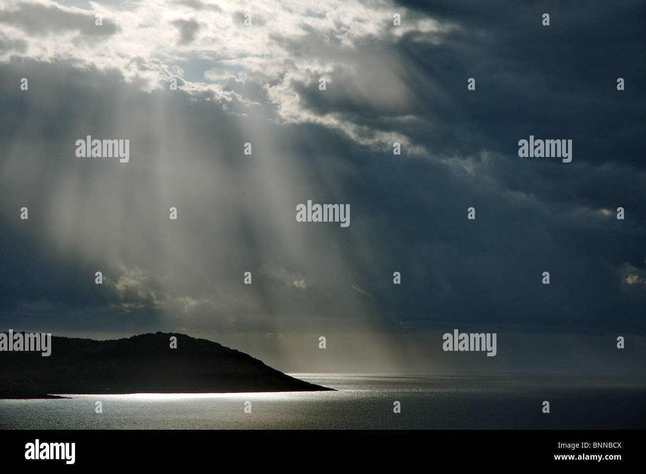 thunder storm low pressure front sunray sunrays Skoutari sea Peloponnese Greece mediterranean Mediterranean sea light shadow Stock Photo