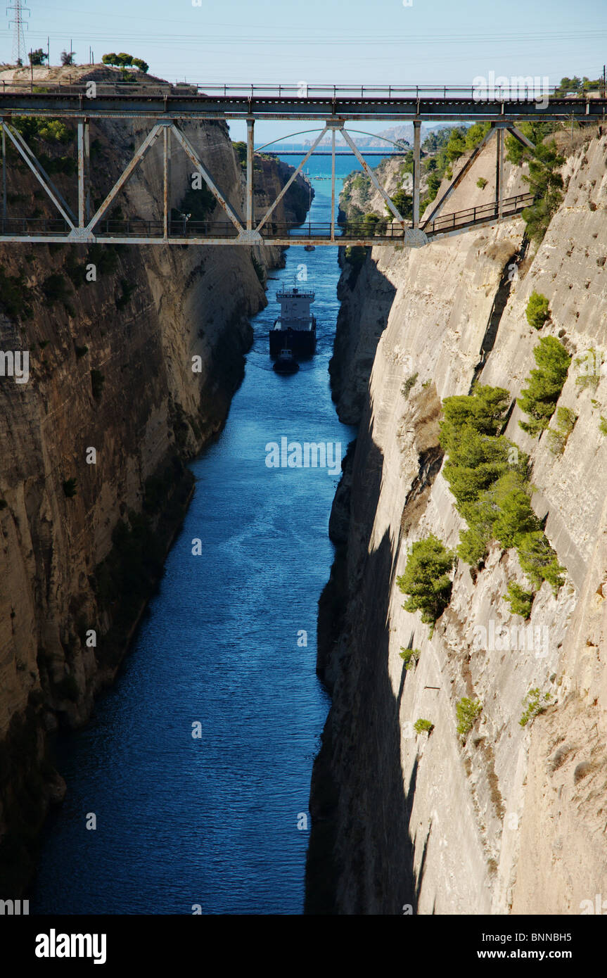 canal Korinth Korinthos blue historic ship vessel bridge Mediterranean sea light shadow Greece Peloponnese mediterranean Stock Photo