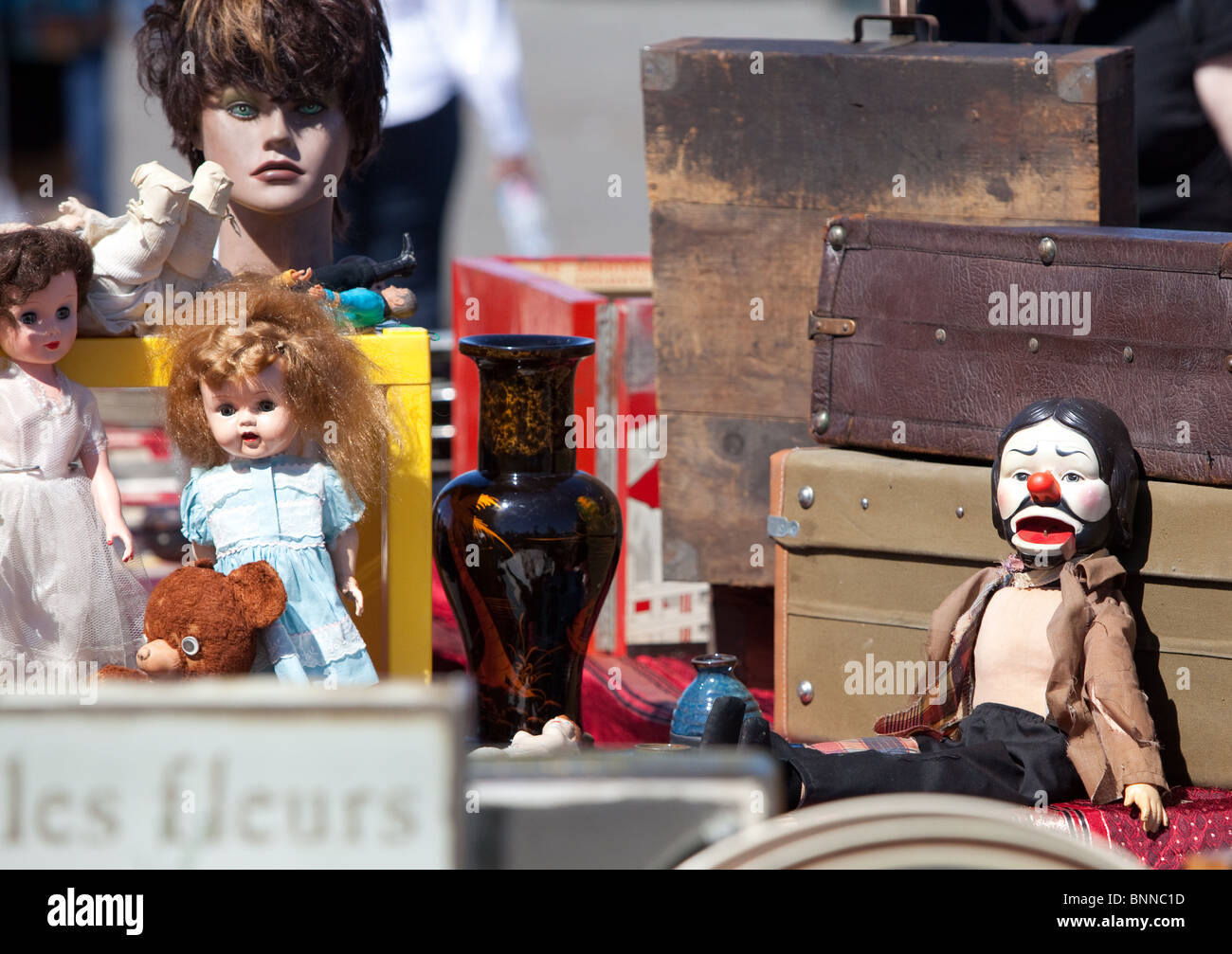 Assorted antique dolls at a flea market Stock Photo Alamy