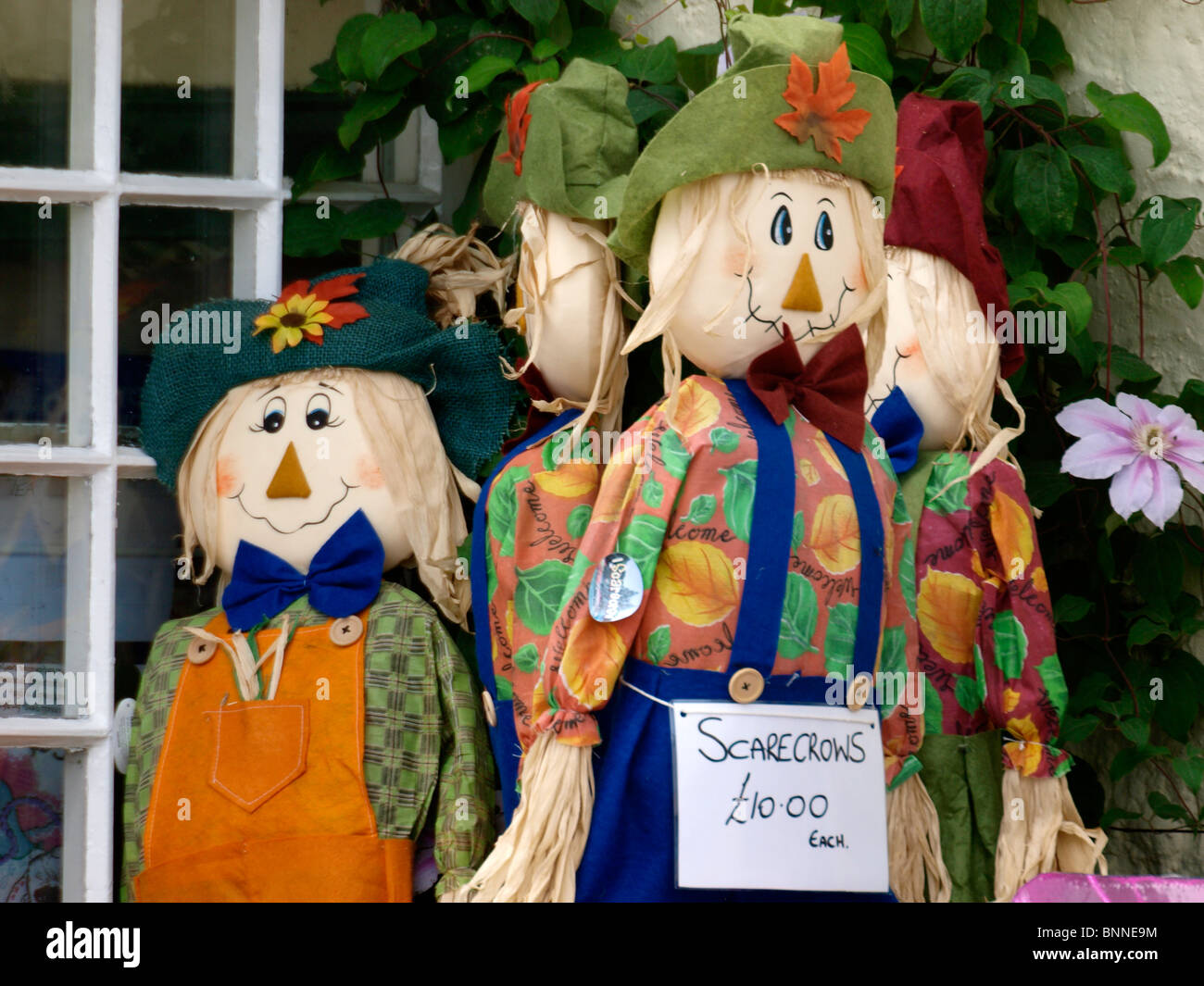 Scarecrows for sale outside a shop at lynmouth, Devon, UK Stock Photo