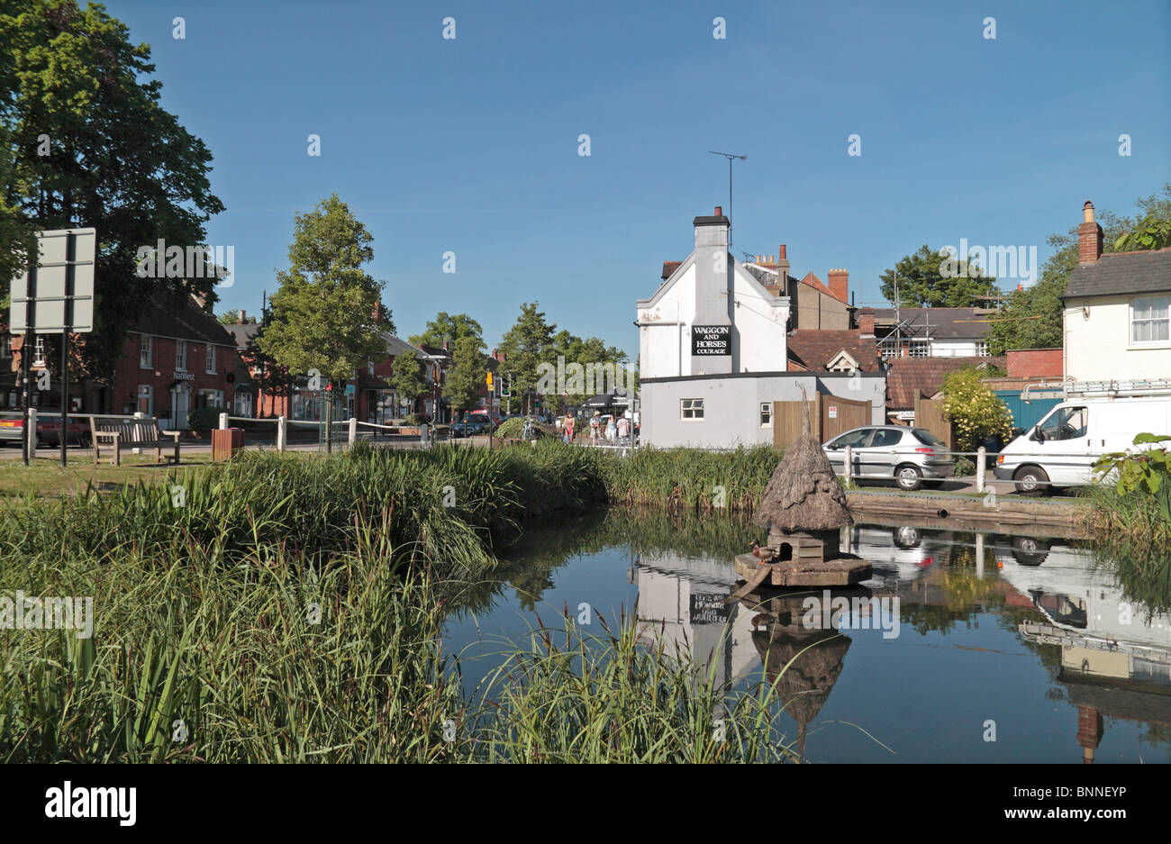 The small village pond & duck house close to the centre of the pretty