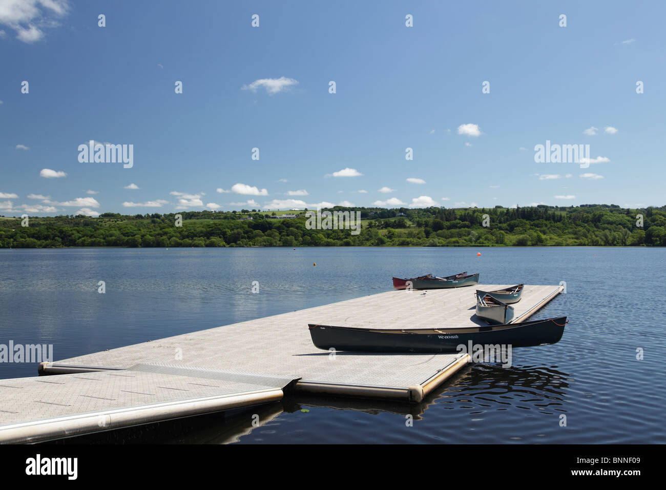 Kayaks on a jetty at Castle Semple Visitor Centre in Clyde Muirshiel Regional Park, Lochwinnoch, Renfrewshire, Scotland UK Stock Photo