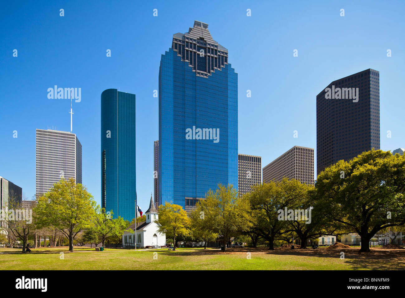 2010 Houston Skyline dwarfing St John church, Texas Stock Photo