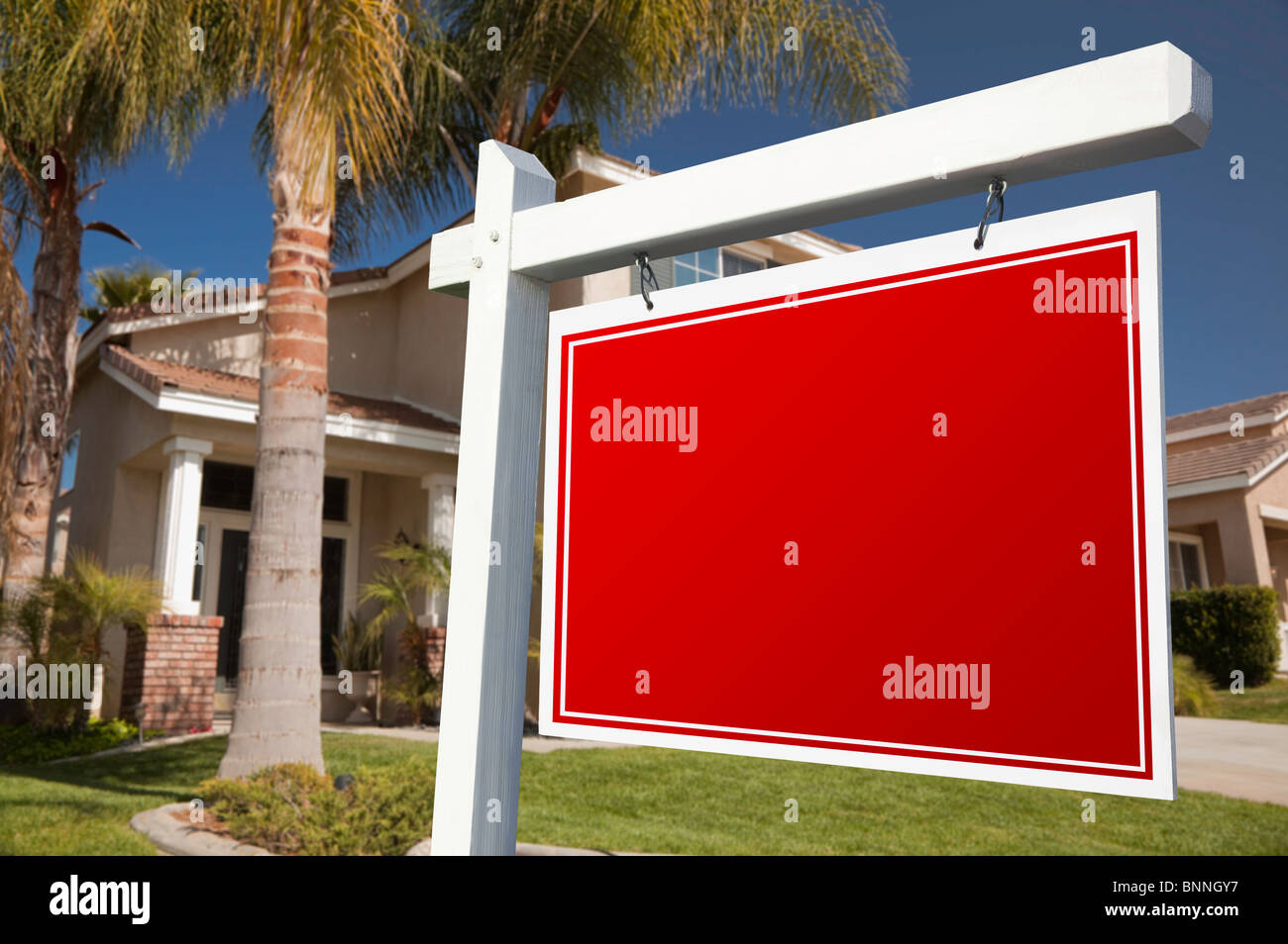 Blank Real Estate Sign in Front of House Stock Photo - Alamy