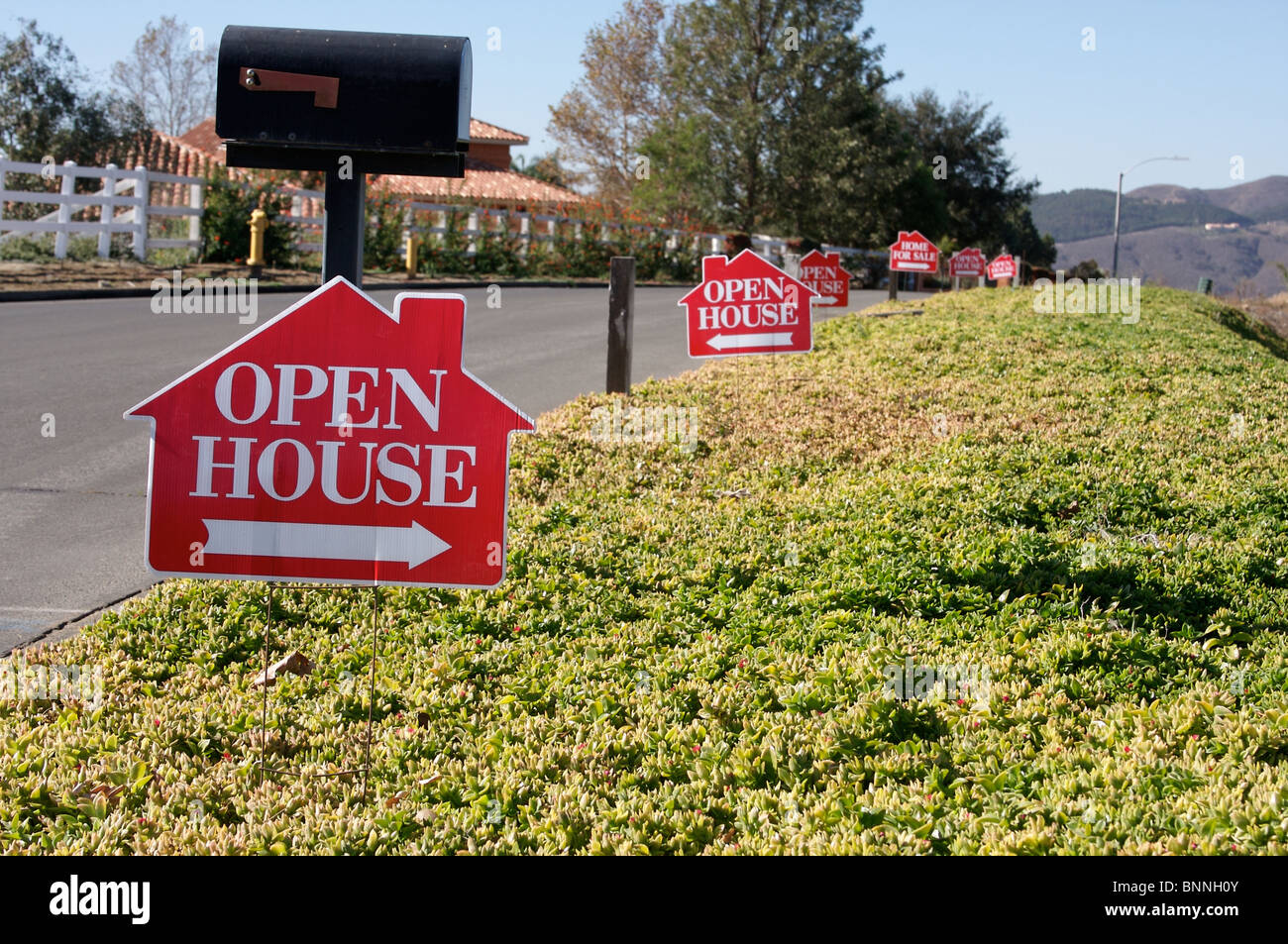 Home For Sale Open House Signs along a Rural Street Stock Photo Alamy