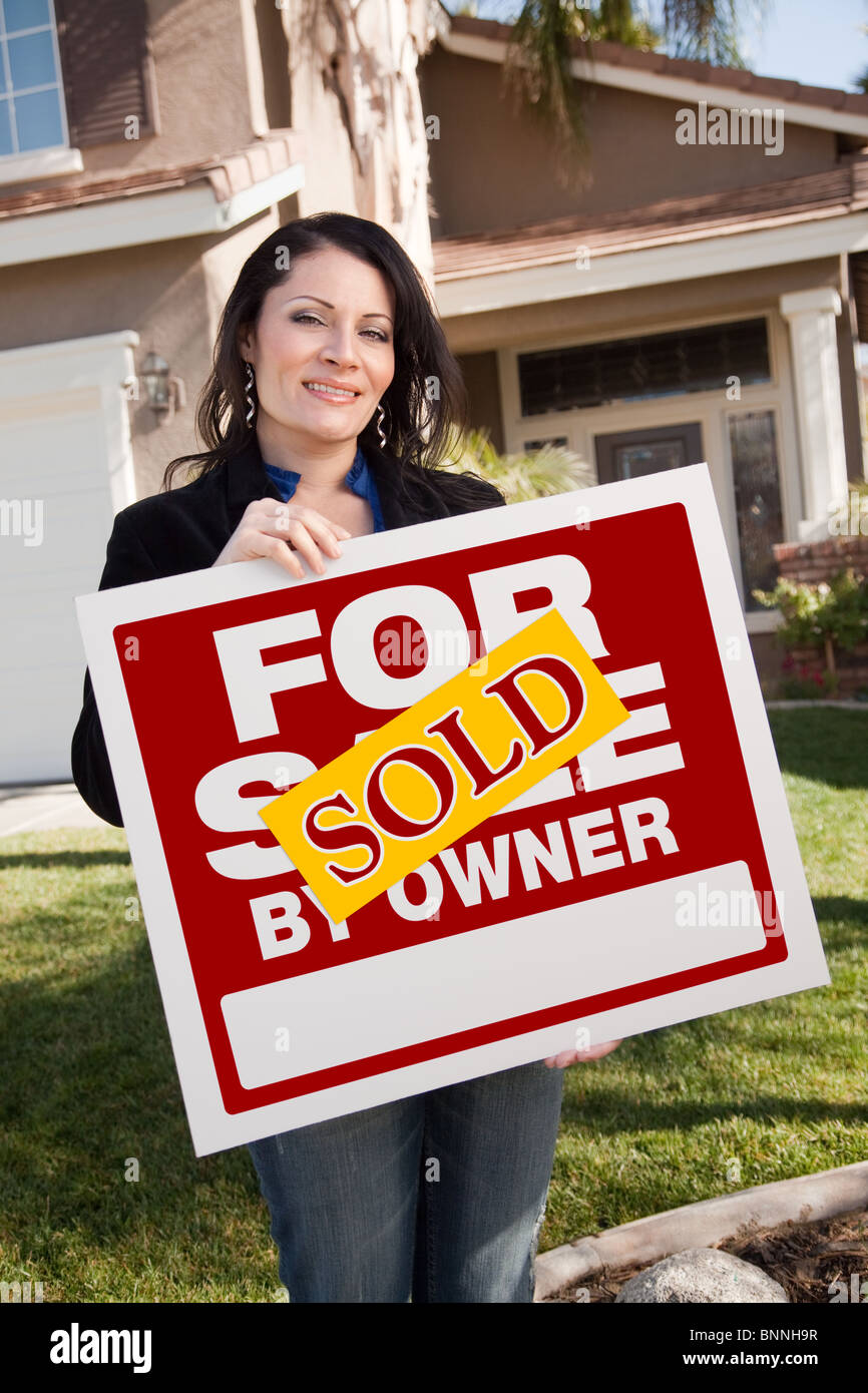 Happy Attractive Hispanic Woman Holding Sold For Sale By Owner Real ...