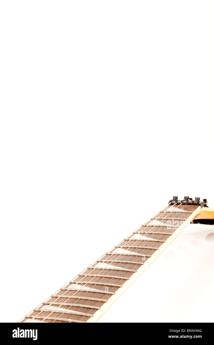 A six string electric guitar isolated on a black background Stock Photo