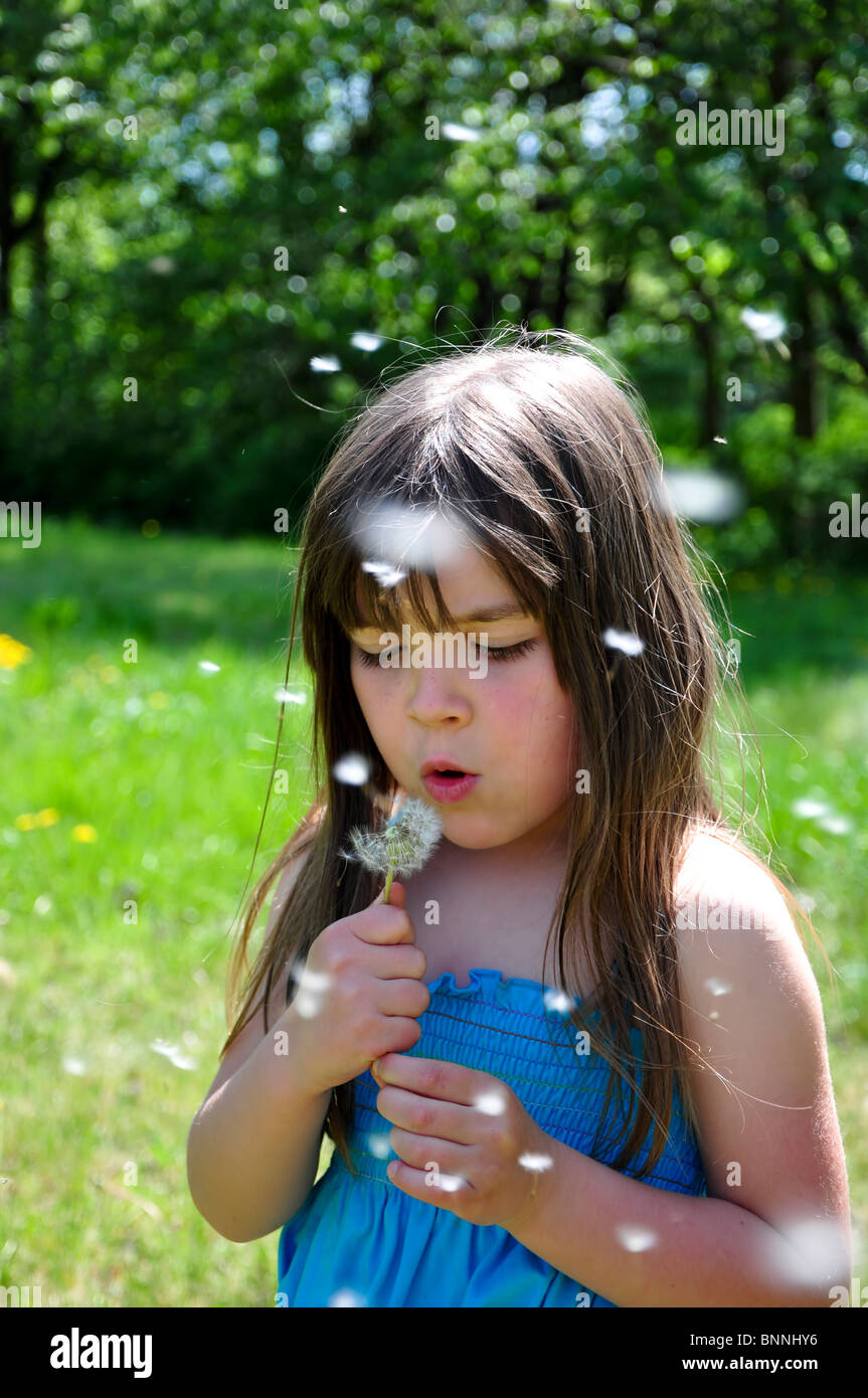 little girl closeup portrait with dandelion Stock Photo - Alamy