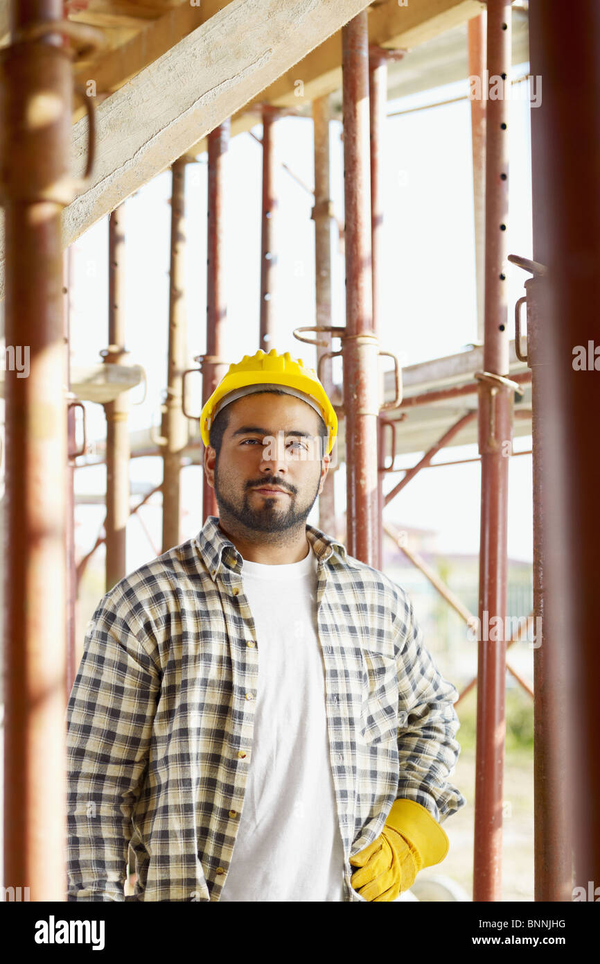 latin american construction worker looking at camera. Stock Photo