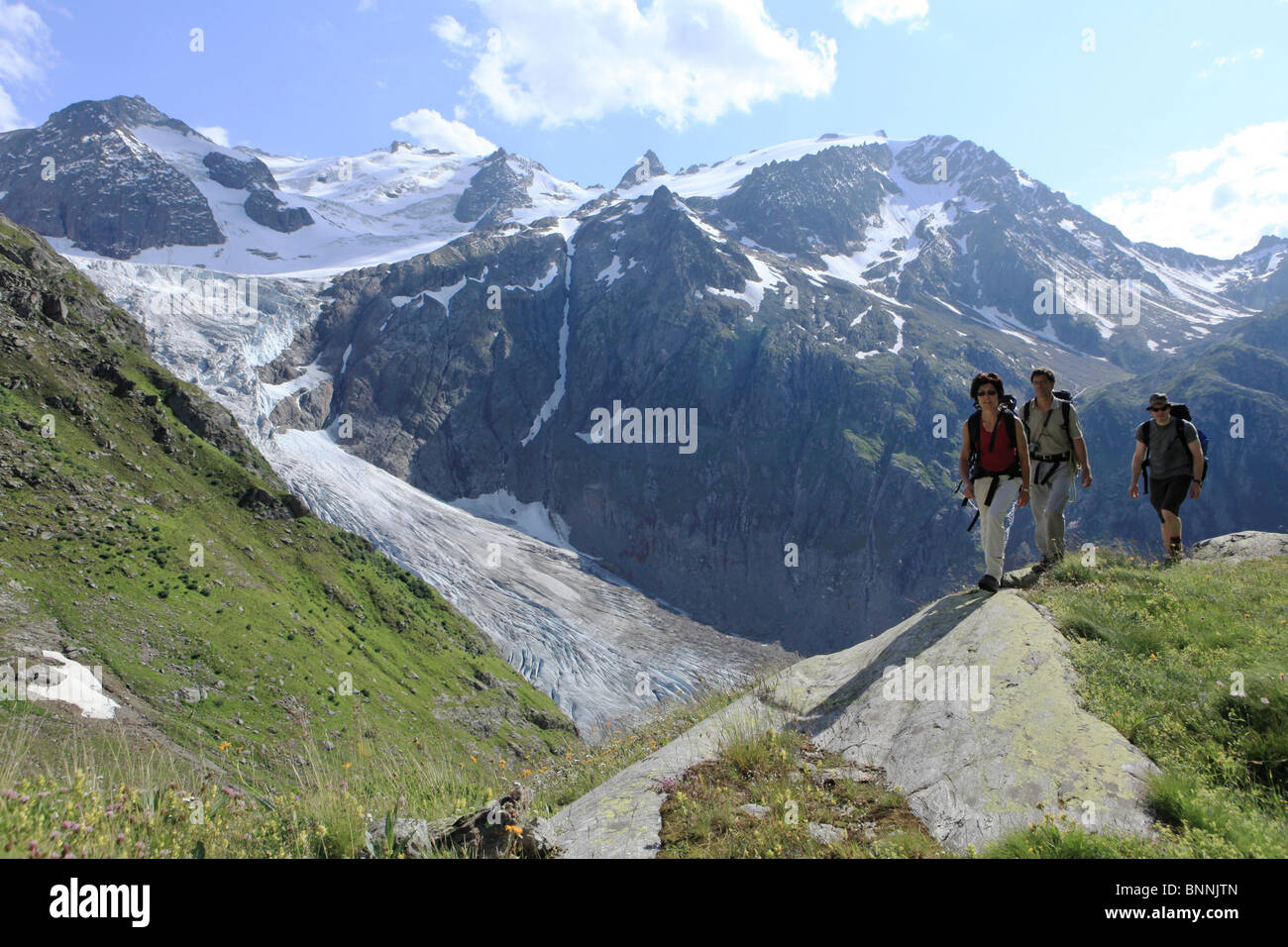 Switzerland swiss walk hike group three Trift glacier glacier ice