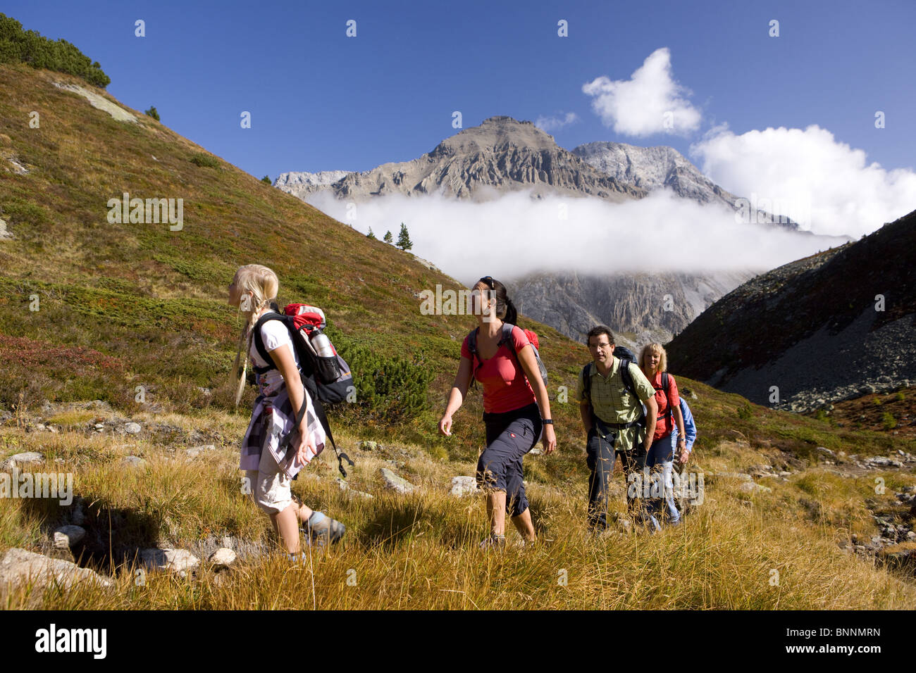 Switzerland swiss walking hiking Fuorcla Crap Alv Albulapass family mountains nature footpath canton Graubünden Grisons Stock Photo