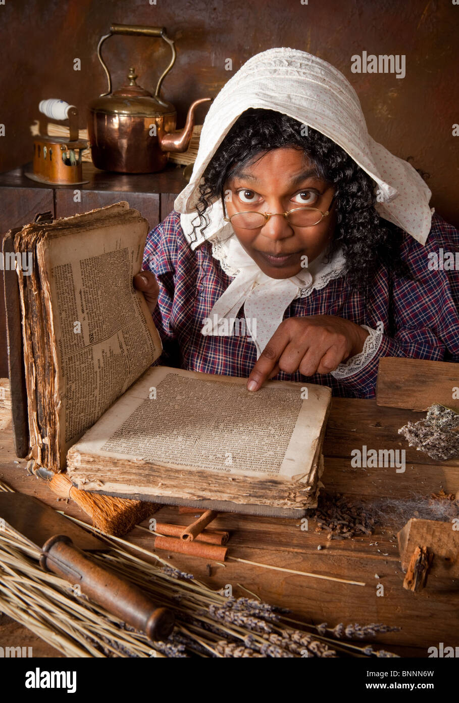 Victorian peasant woman mixing herbs and ingredients in an antique
