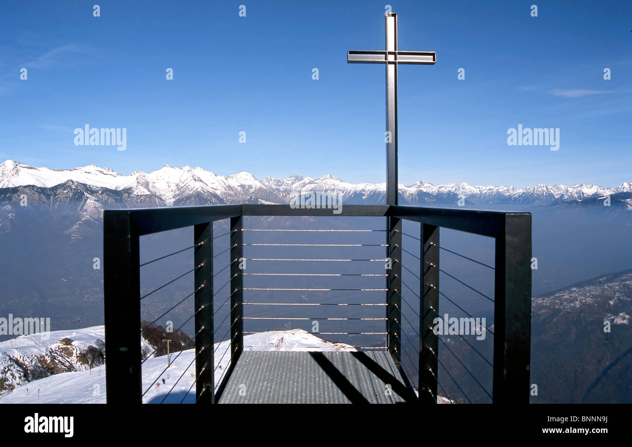Monte Tamaro Mario Botta Santa Maria degli Angioli Ticino Switzerland cross church mountains Stock Photo