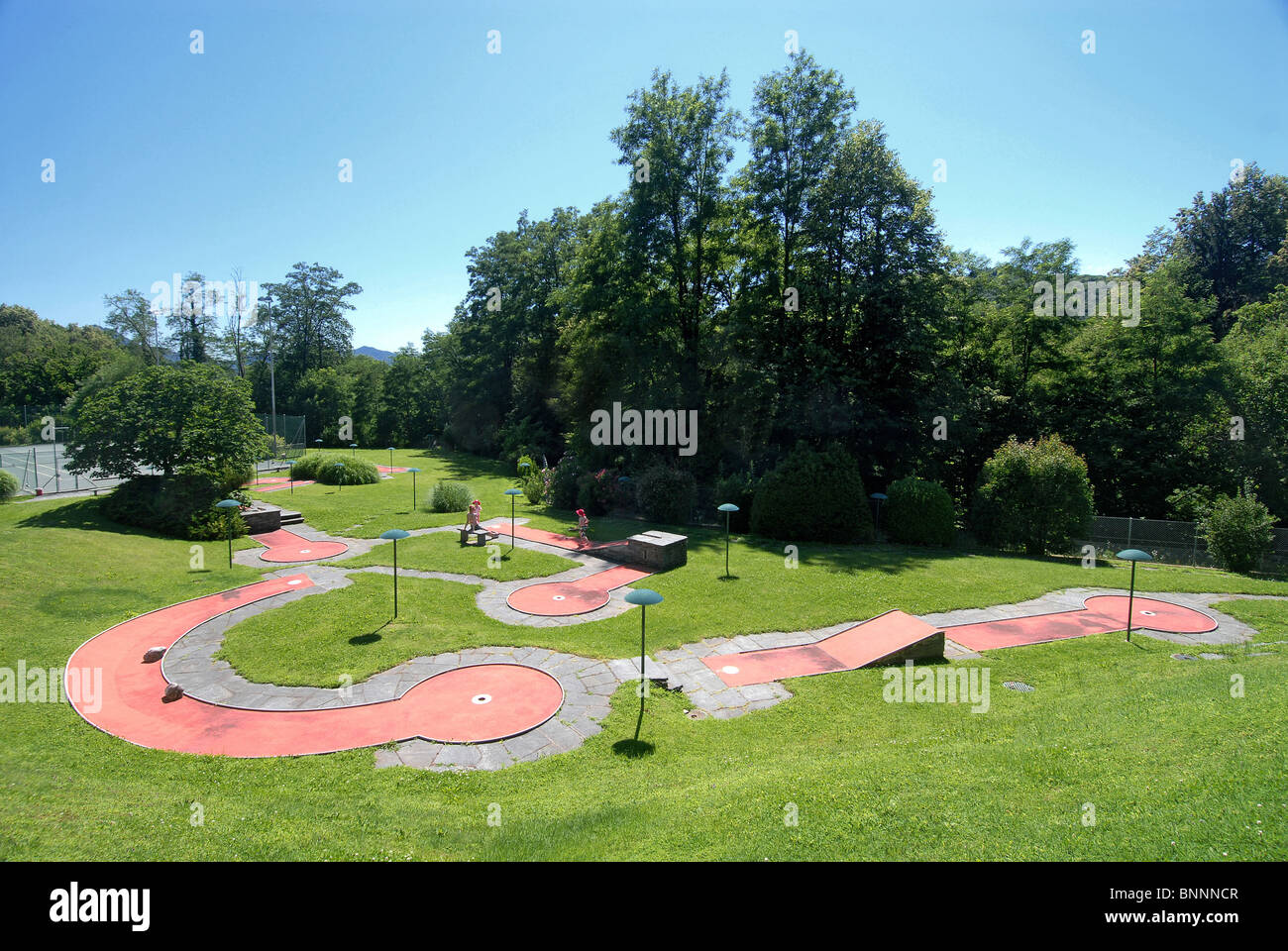 Mini-golf spare time holidays play game sport arrangement enclosure park  Switzerland Ticino Stock Photo - Alamy