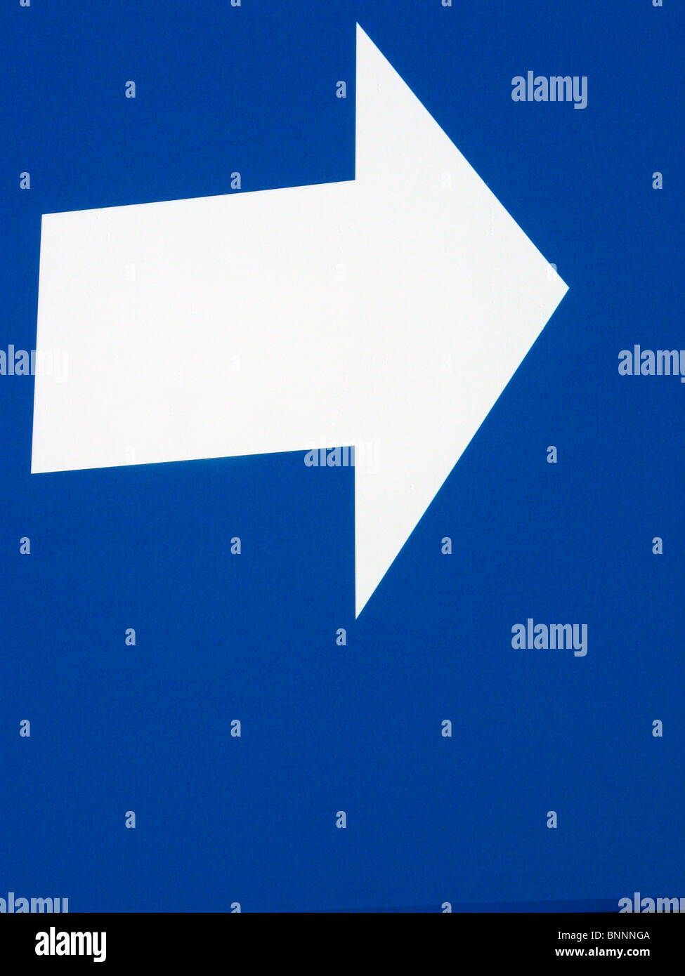 Road sign blue background white arrow Kiel Germany concepts Stock Photo ...