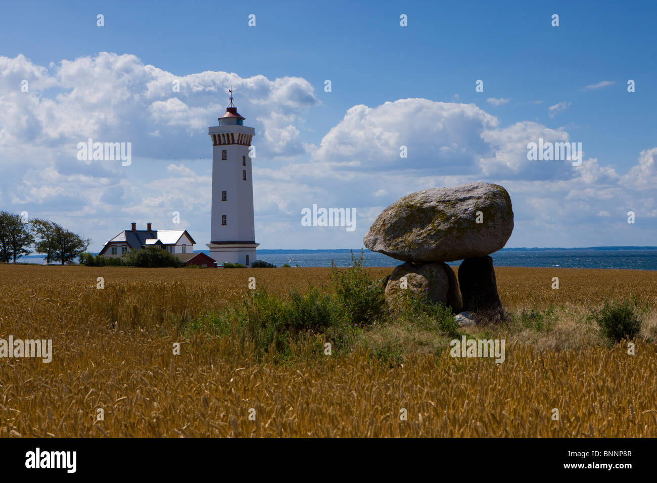 Helnaes Denmark Funen Fyn lighthouse house home coast sea grainfield cornfield dolmen cult site