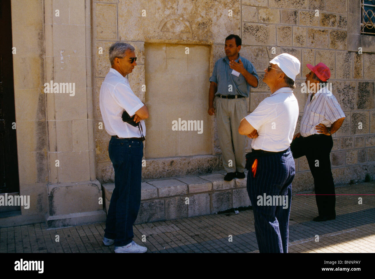 Deir El Qamar Lebanon Palace Tour Official Guide With Tourists Wearing Official Badge Stock Photo