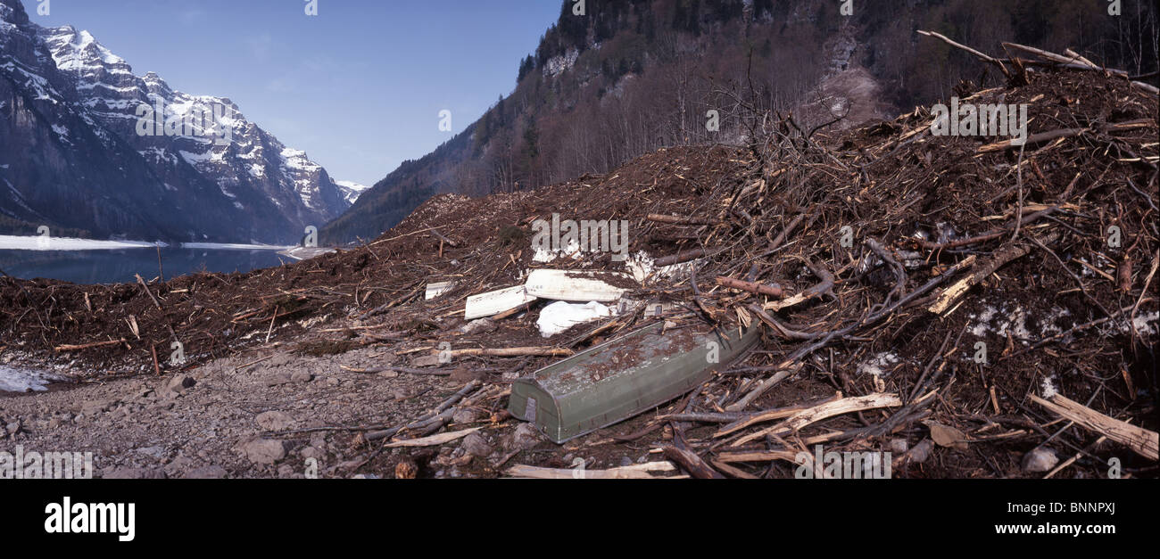 Klöntal GL avalanche damages stone mountains canton Glarus avalanche disaster catastrophe damage harm mountain lake Switzerland Stock Photo