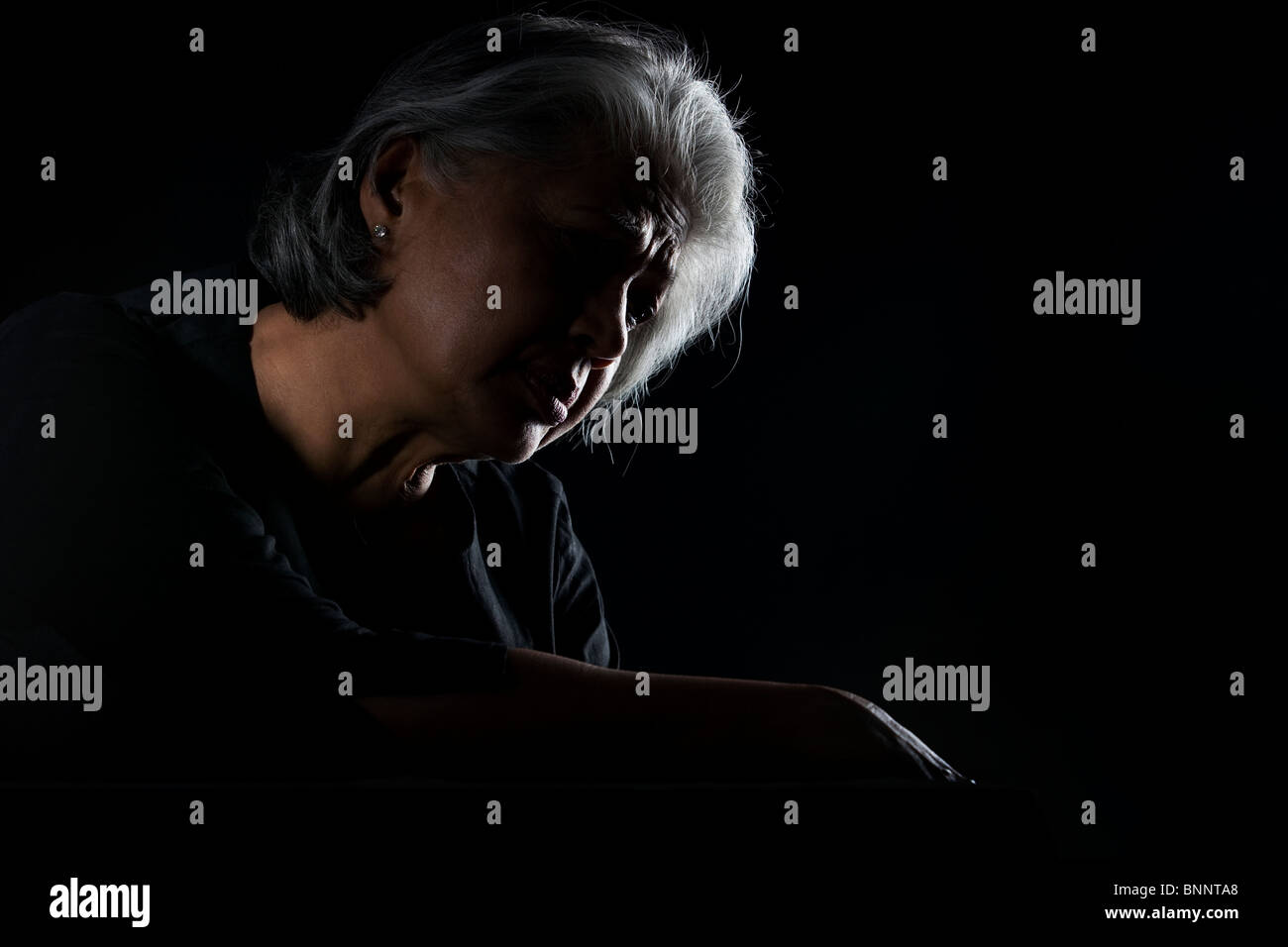 Old indian woman sad hi-res stock photography and images - Alamy