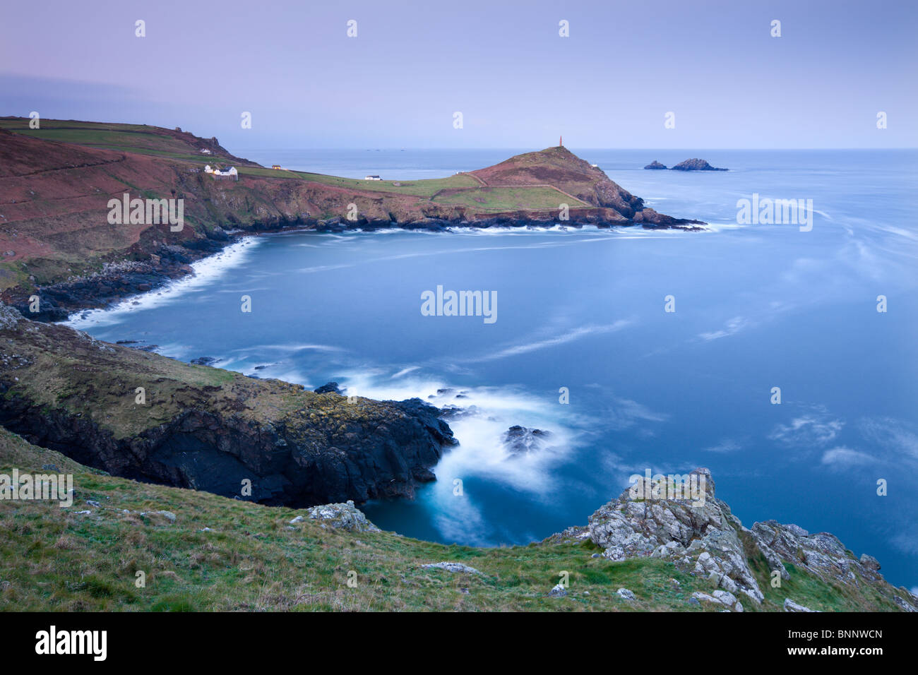 Dawn vista over Porth Ledden towards Cape Cornwall and The Brisons, from Kenidjack Castle, Cornwall, England. Stock Photo