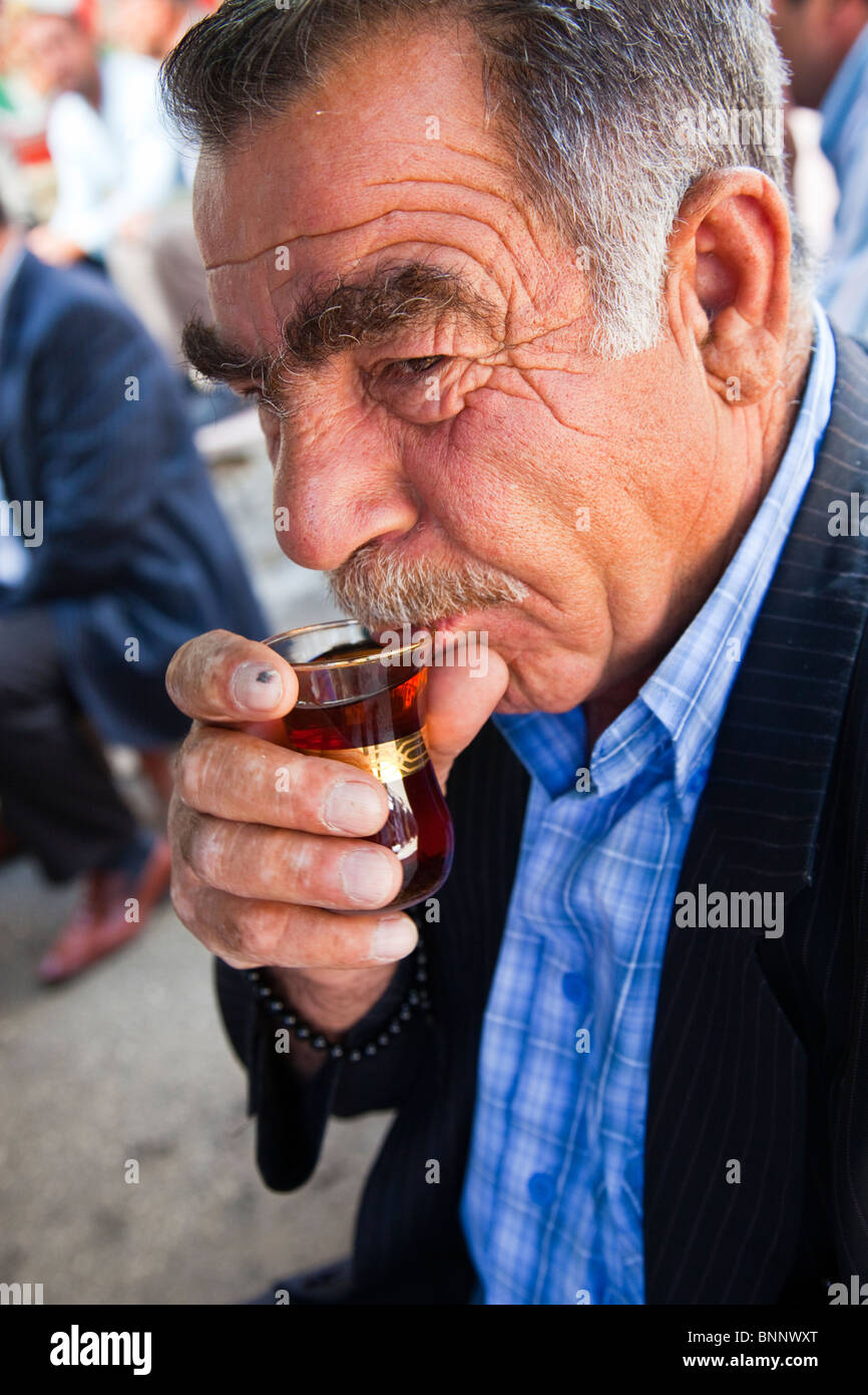Man drinking chai in Van, Turkey Stock Photo
