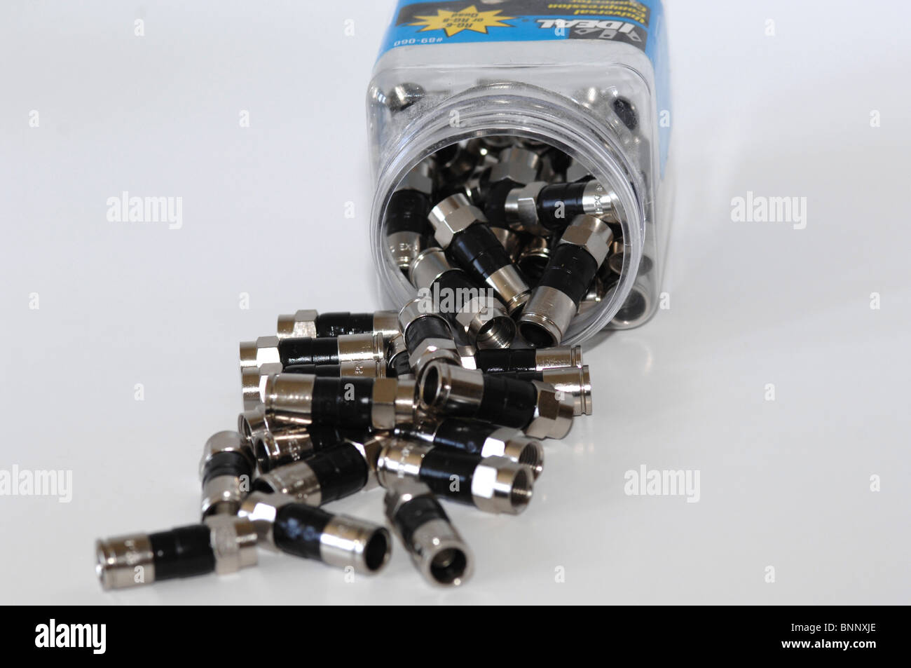 Compression fit F-connectors for RG6 or RG6 Quad Coaxial Cable Stock Photo