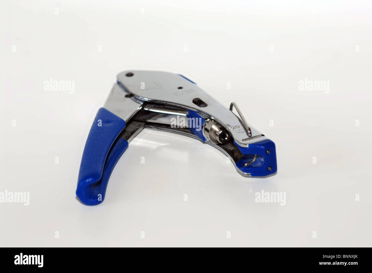 Tool to Install Compression fit F-connectors for RG6 or RG6 Quad Coaxial Cable Stock Photo
