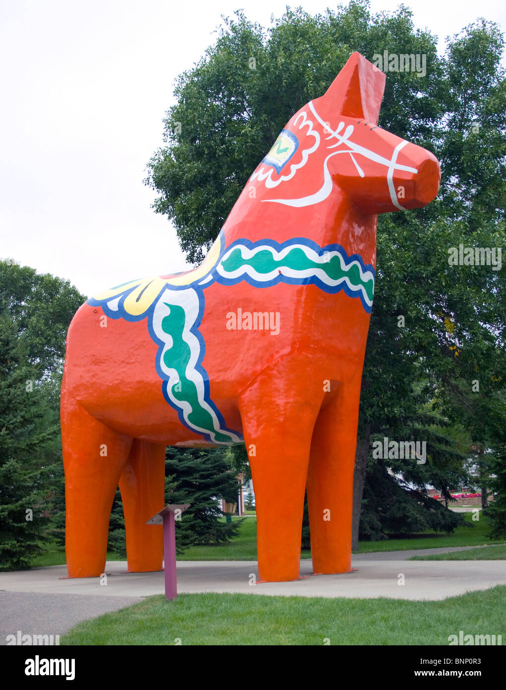 A giant Dala horse statue towers over Minot, North Dakota—a colorful nod to Swedish heritage and hometown pride. Stock Photo