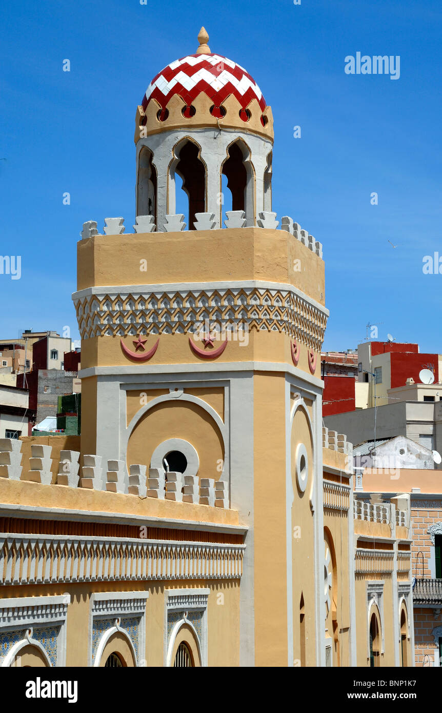 Ornate Minaret of the Melilla Mosque, a Moorish or Andalusian-style mosque (1945) designed by Enrique Nieto, Melilla, Spain Stock Photo