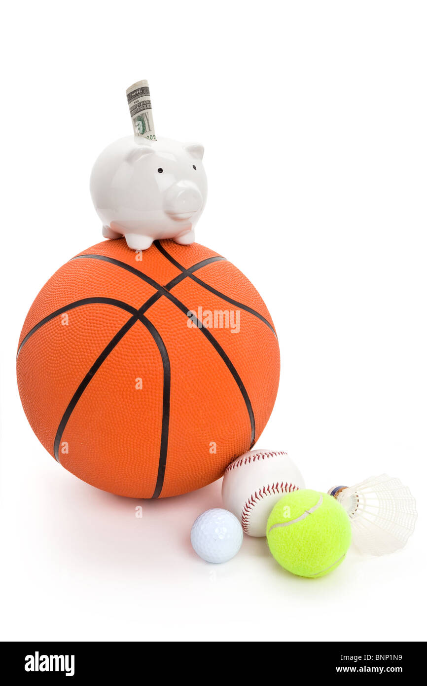 Piggy Bank and balls, concept of sport fund Stock Photo