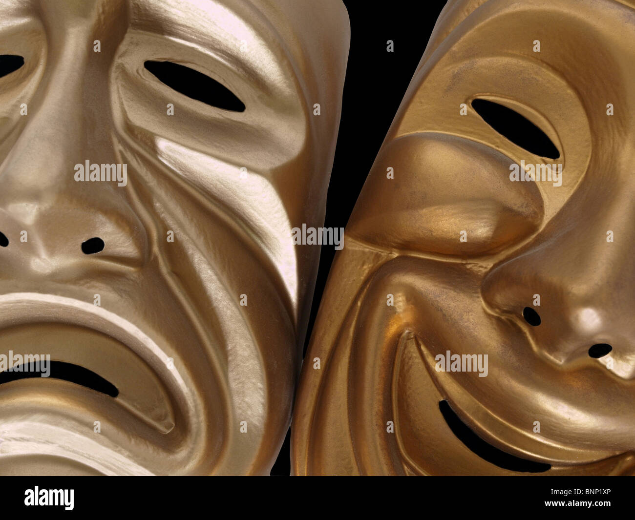 Theatrical comedy and tragedy masks, isolated on black. Stock Photo