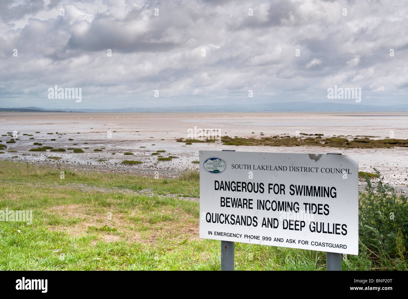 Dangerous for swimming sign at Morecambe Bay, Cumbria, UK Stock Photo