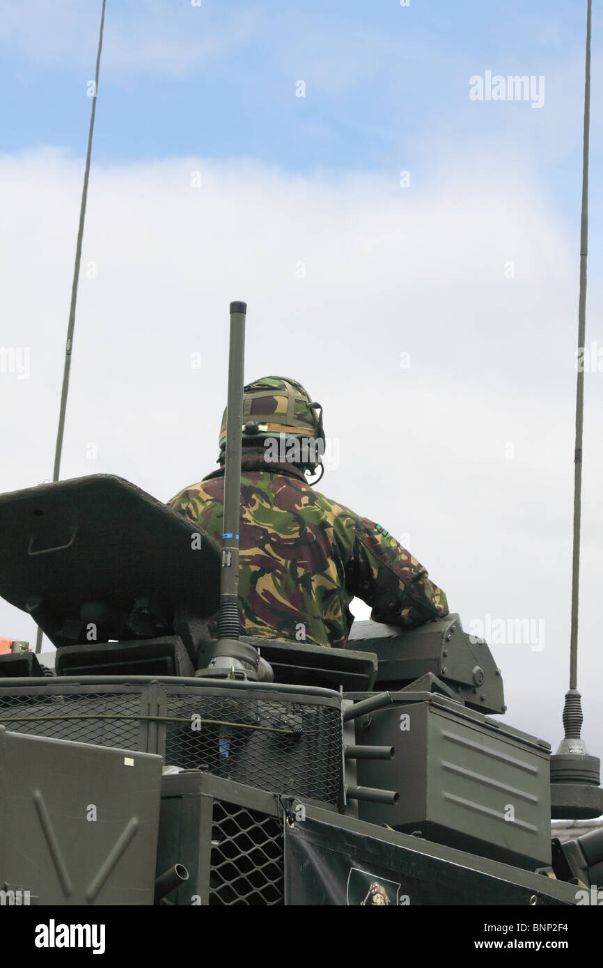 British soldier aboard an armoured vehicle Stock Photo - Alamy
